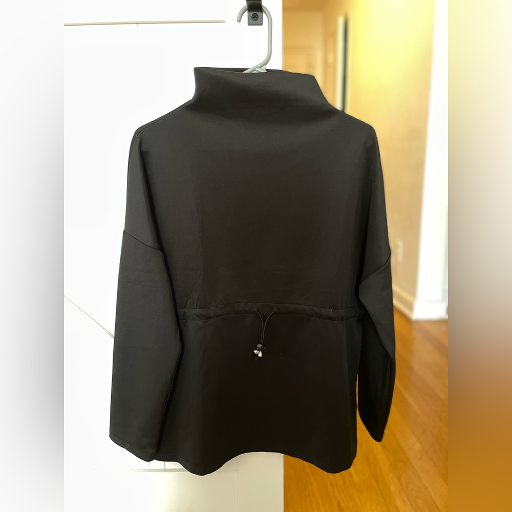 Long sleeve black top. Only worn once. Clean.